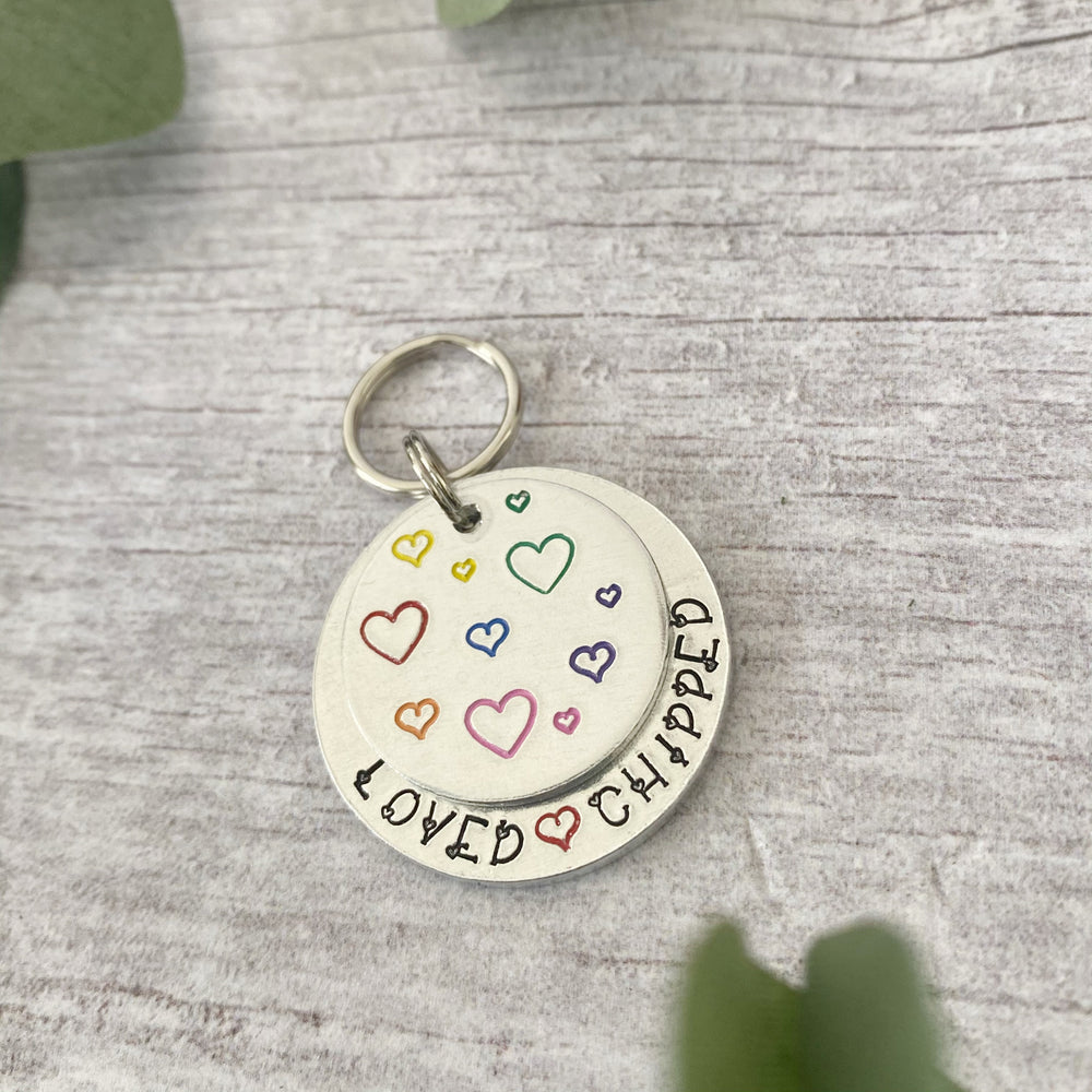 
            
                Load image into Gallery viewer, rainbow hearts dog tag
            
        
