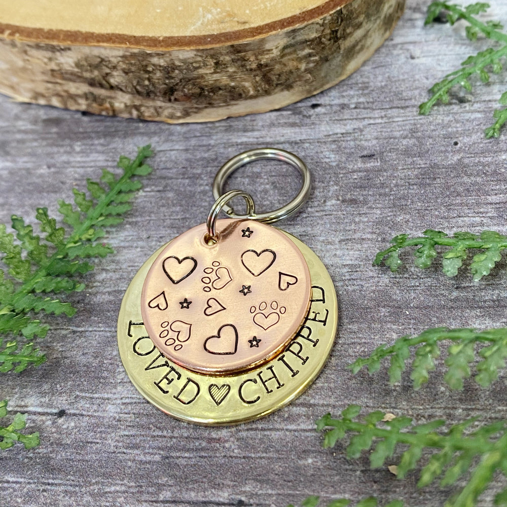 copper and brass dog tag